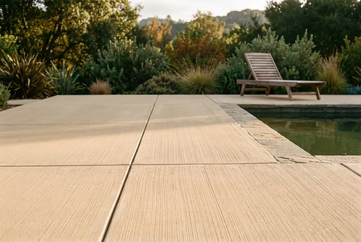 Broom-finished concrete pool deck with control joints