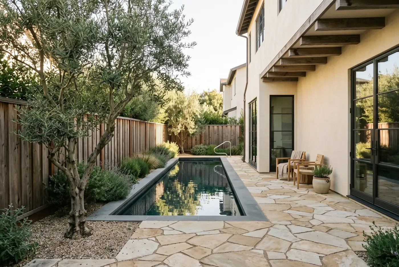 Lap pool running along a single side fence in a narrow backyard